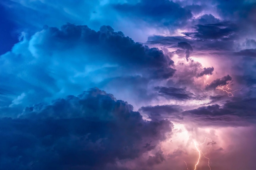 A stormy sky with clouds and lightning.