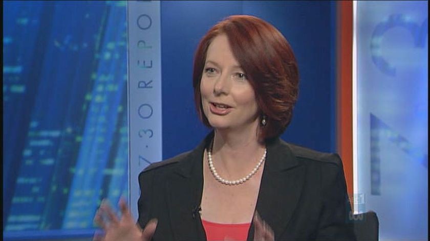 Prime Minister Julia Gillard says her 'moving forward' slogan reflects the optimistic spirit of Australia.