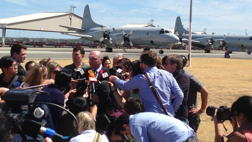 Warren Truss speaks to the media at RAAF Pearce base