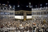 Pilgrims circle counterclockwise the Kaaba