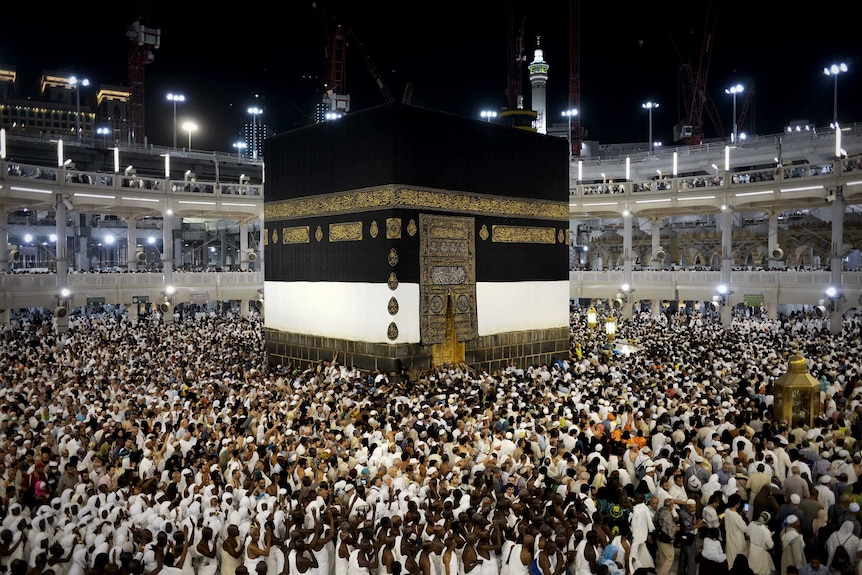 Pilgrims circle counterclockwise the Kaaba