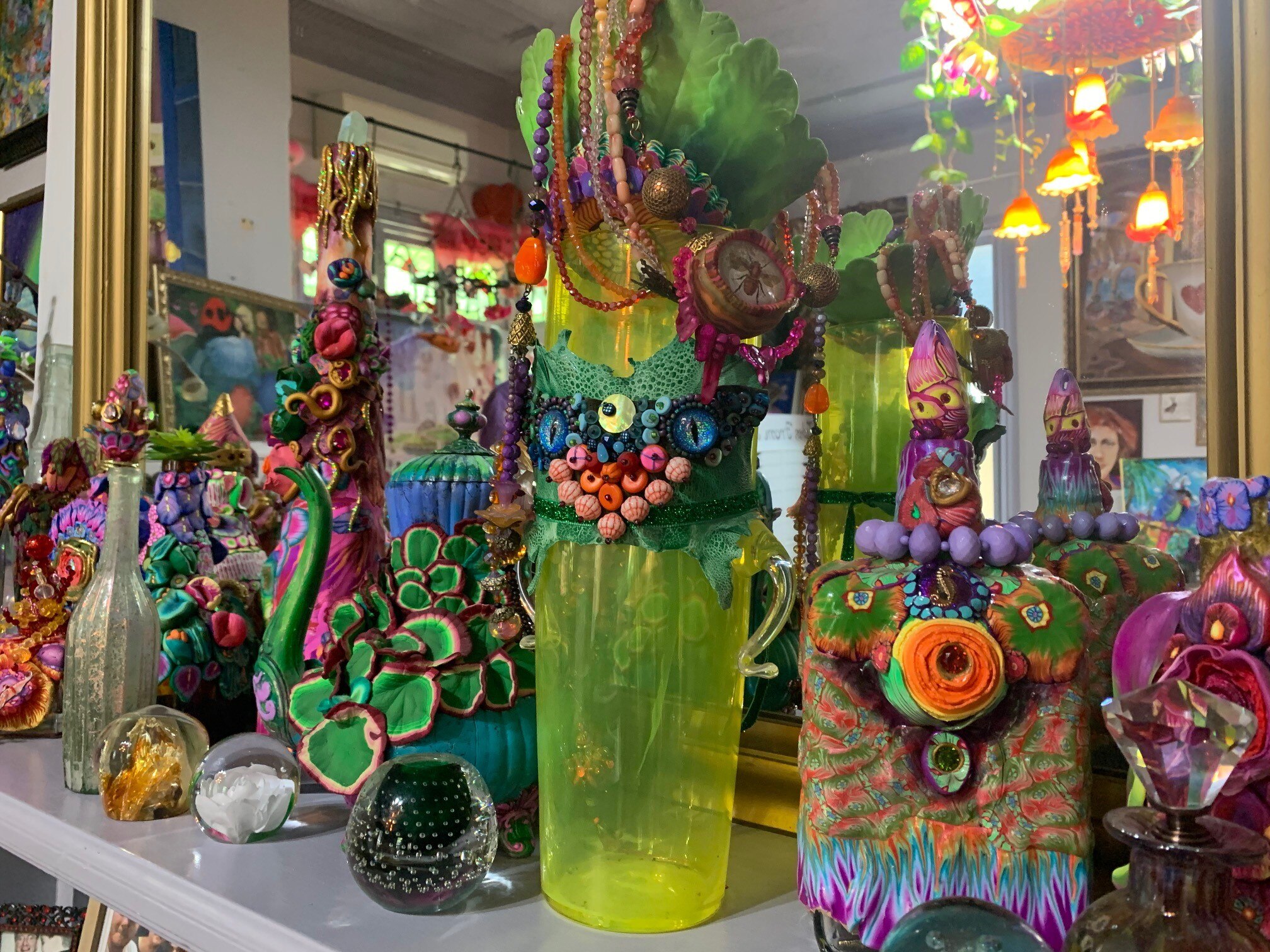 mantle piece with polymer floral vase artworks