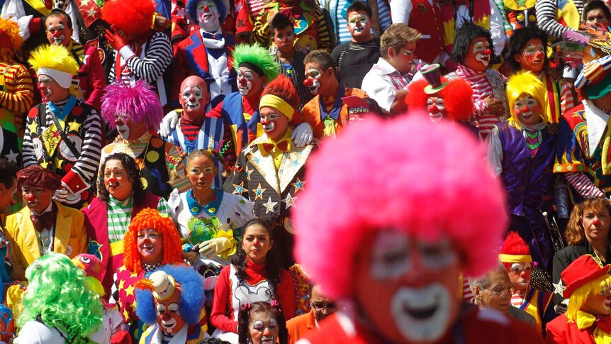 Clowns gather in a colourful crowd in Mexico City