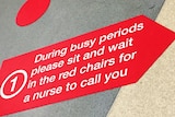 Sign on Royal Hobart Hospital emergency department floor.