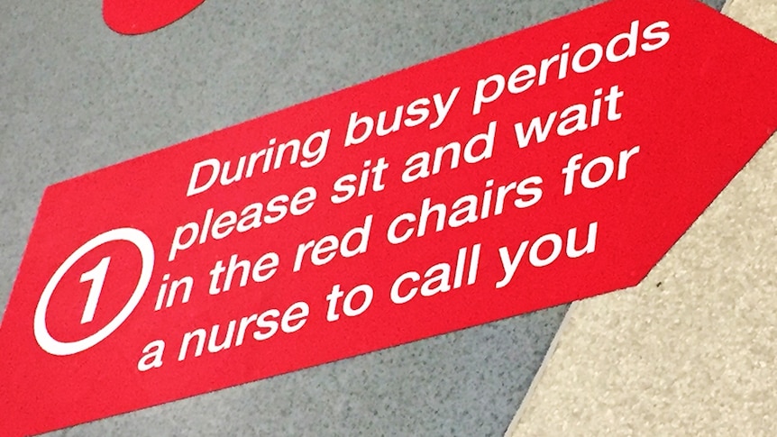 Sign on Royal Hobart Hospital emergency department floor.
