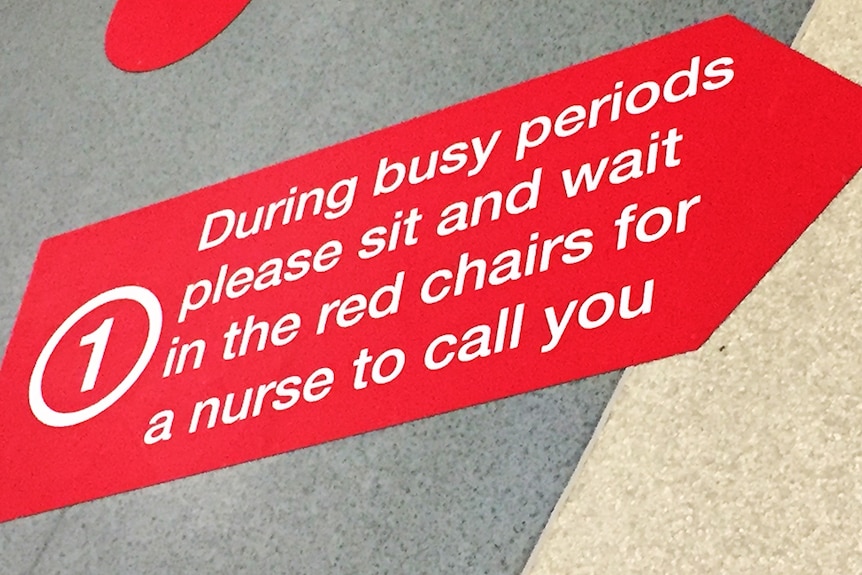 Sign on Royal Hobart Hospital emergency department floor.