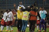 Ghana's coach James Kwasi Appiah celebrates with his team after Ghana qualified for the World Cup.