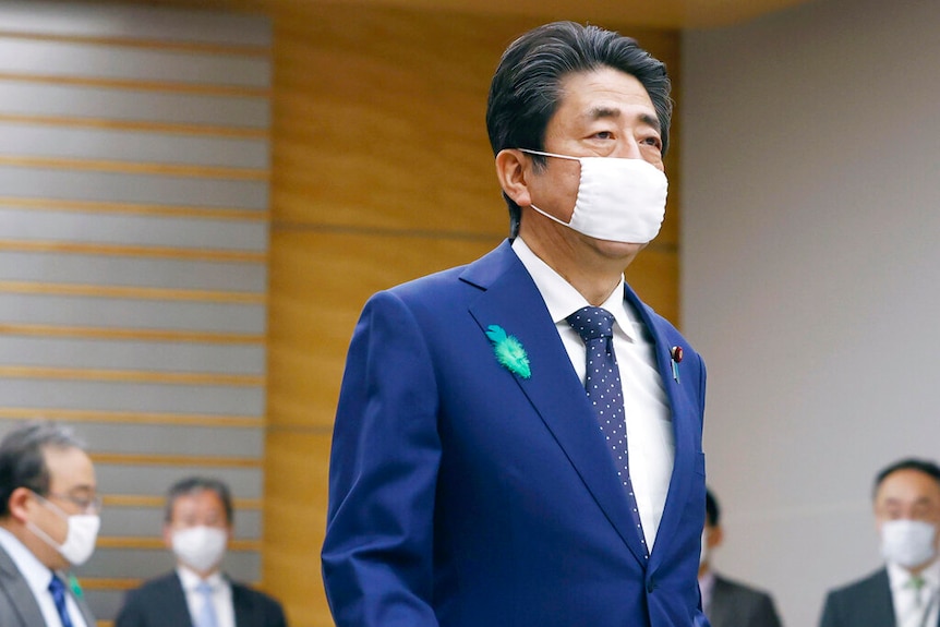 Japanese Prime Minister Shinzo Abe wearing a face mask