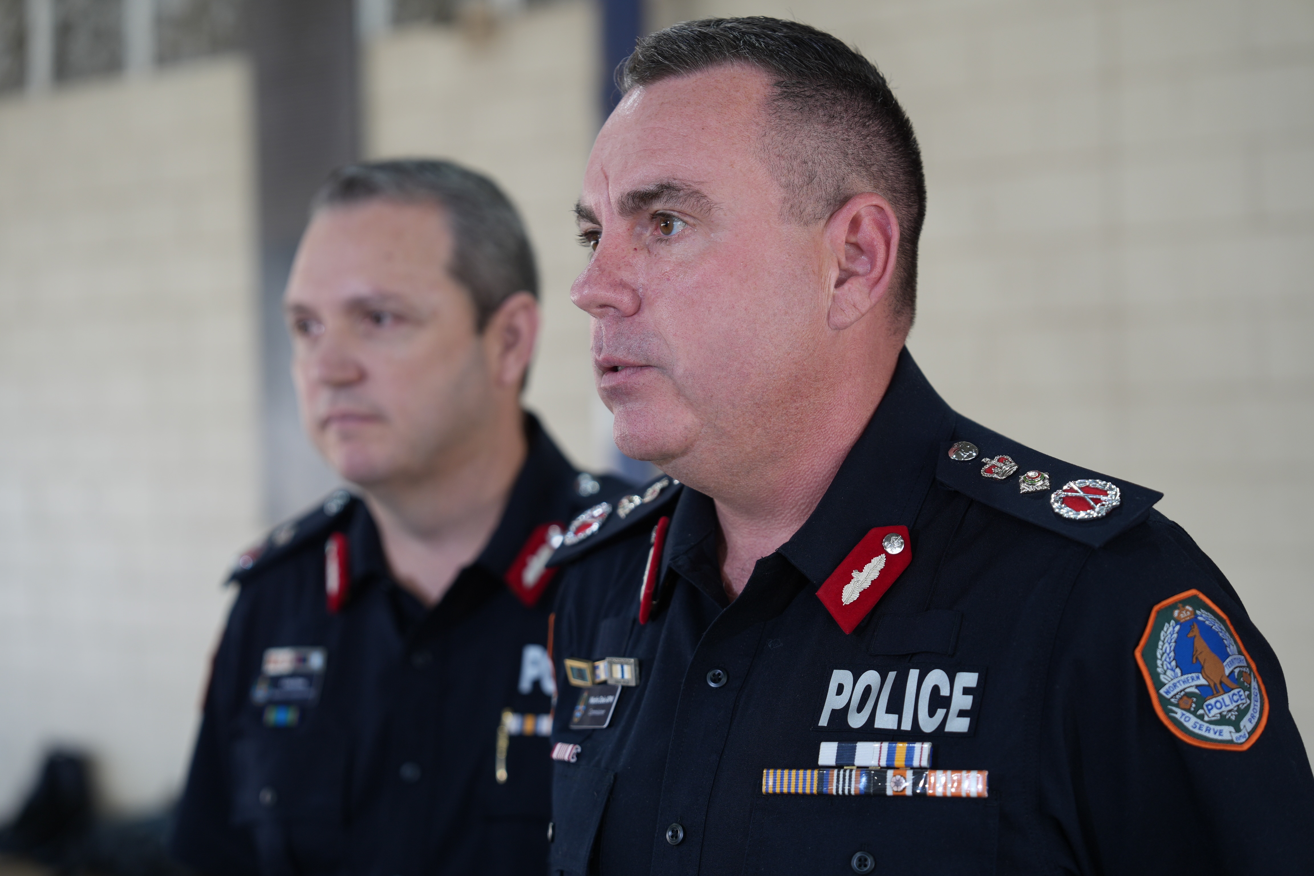 Close up of Martin Dole, NT Police Commissioner in a blue police uniform.