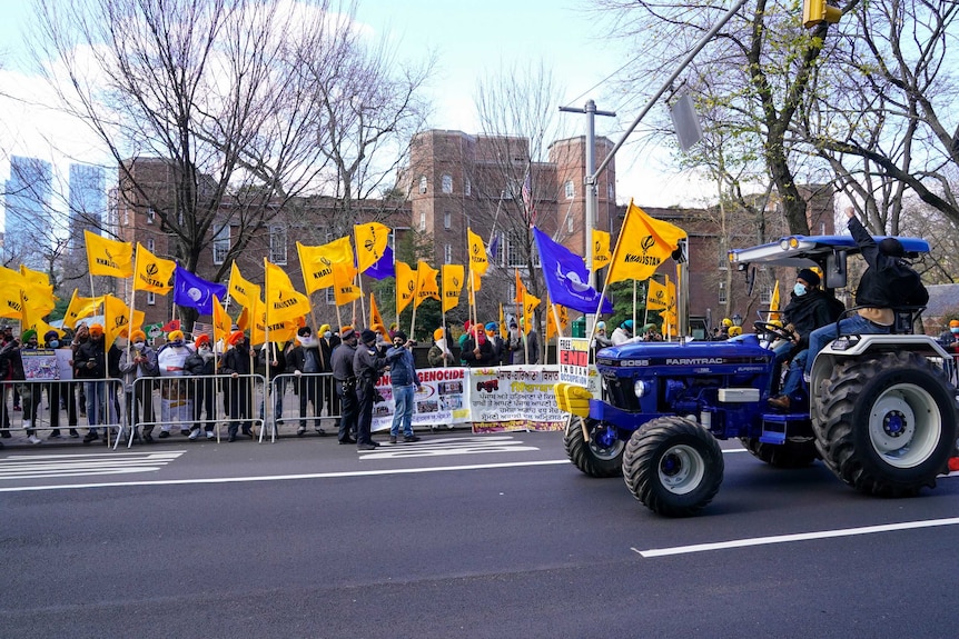 A tractor and protesters near the Indian consulate in New York
