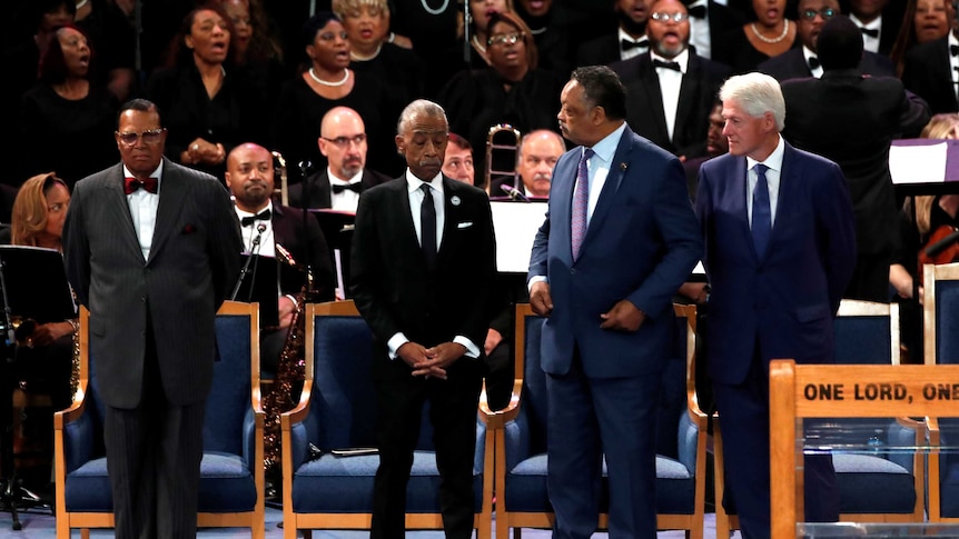 Louis Farrakhan, Al Sharpton, Jesse Jackson and Bill Clinton attend the funeral service.