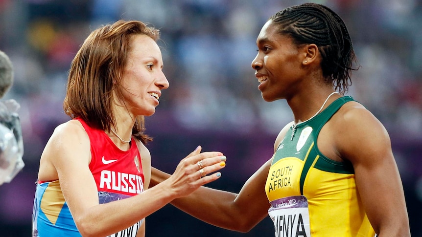 LtoR Mariya Savinova celebrates with Caster Semenya after the women's 800m final.