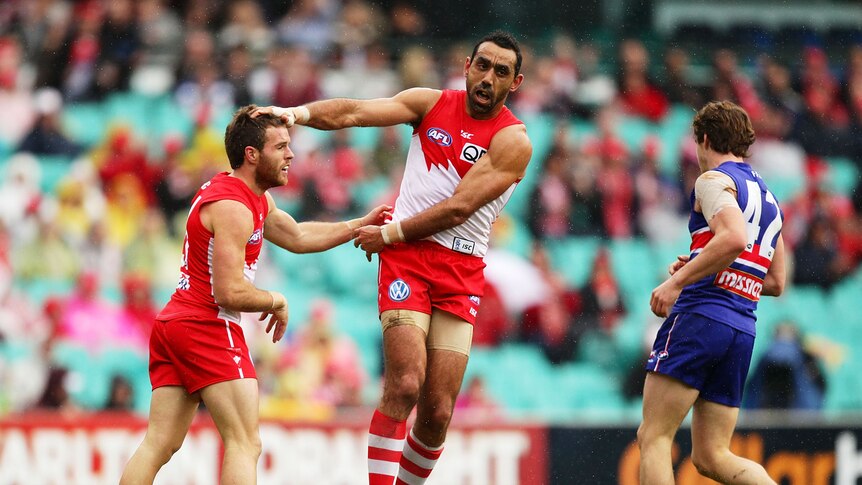 Superstar effort ... Adam Goodes (c) bagged a couple of goals and topped 30 possessions for Sydney.