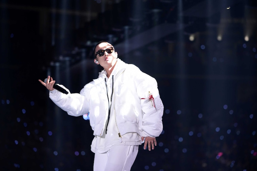 Chinese rap singer GAI, performs during a New Year concert in Guangzhou