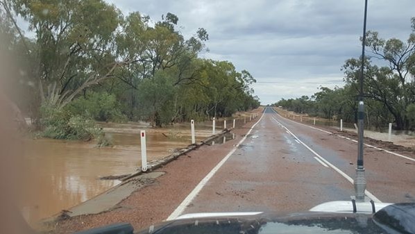 Creek lapping on bridge