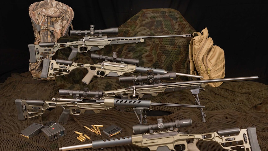 A display for rifles, bullets and camouflage equipment.