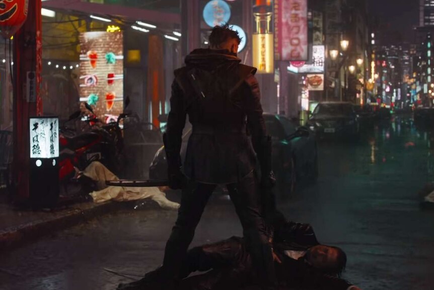 Jeremy Renner's Hawkeye, now Ronin, stands in a street in the Avengers: Endgame trailer.