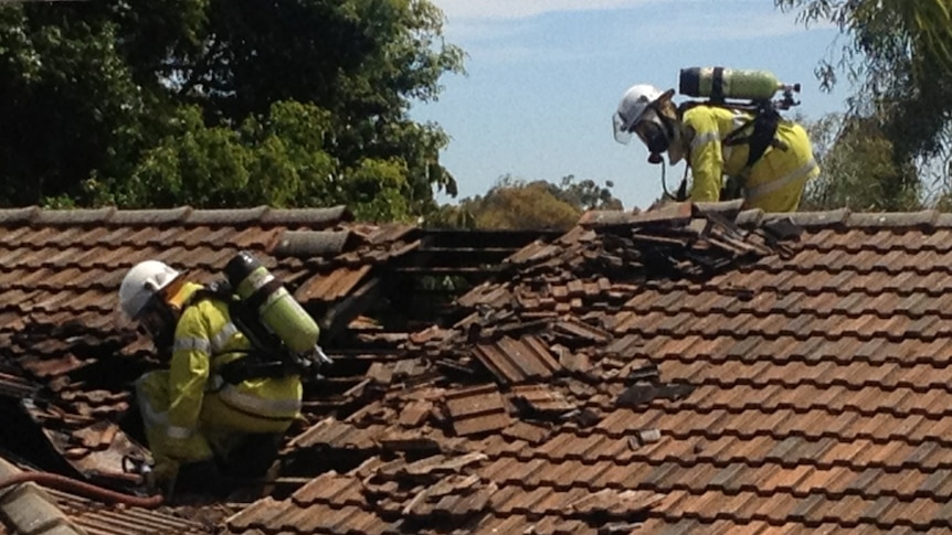 Firefighters on the roof.