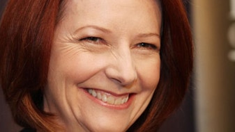 Julia Gillard smiling at the National Press Club (Getty Images: Cole Bennetts)