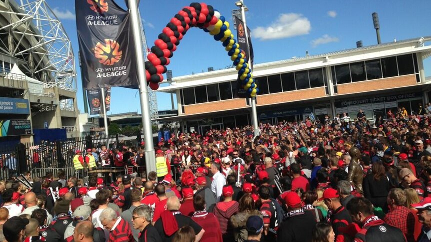 Wanderers fans queue up outside Sydney Football Stadium.