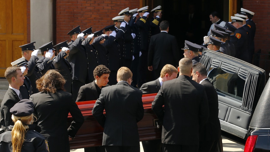 The casket containing the body of Krystle Campbell arrives at St Joseph Church for her funeral in Medford, Massachusetts.