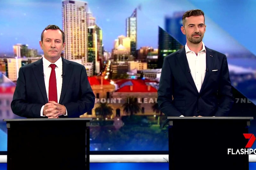 WA premier Mark McGowan and Opposition leader Zak Kirkup stand at podiums next to each other