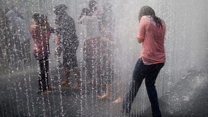 People escape heat-wave conditions in London