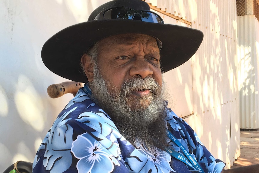 Stephen Baamba Albert wearing a black hat.