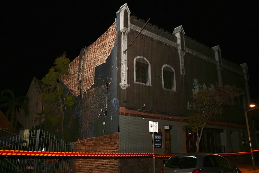 An external photo of the Nightclub which shows where bricks and part of the render have fallen off a side wall.