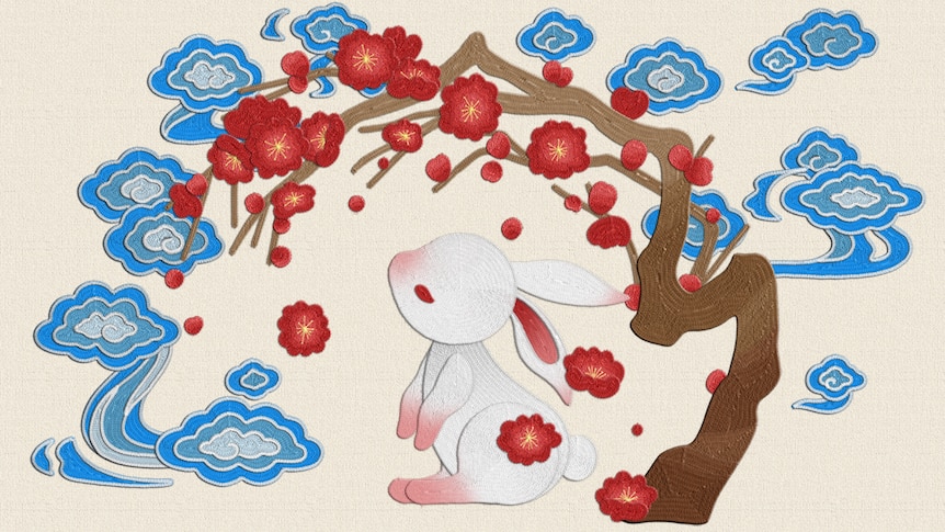 A vector artwork rabbit on a red background surrounded by flowers.