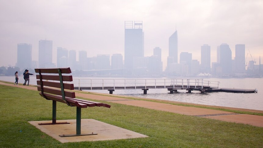 Smoke over the Perth CBD skyline viewed from South Perth