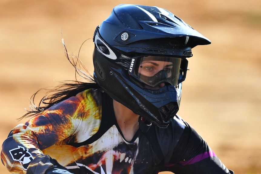 Close up of female motorbike rider's face.