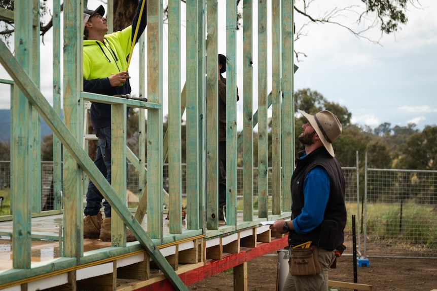 Lachlan Ward and apprentice building tiny home.