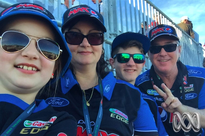 The McIntosh family from the Burdekin stand in front of the stands at Townsville's Reid Park for the Townsvilel 400 supercars