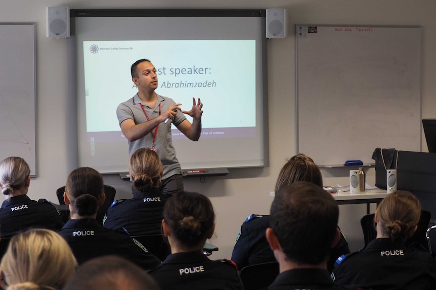 Arman Abrahimzadeh speaking to a class of police cadets.