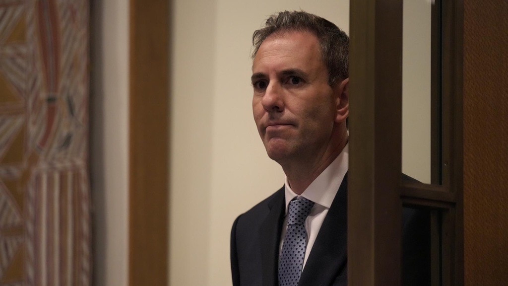 a man in a suit looking serious