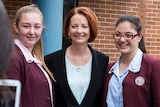 Julia Gillard has her photo taken with students