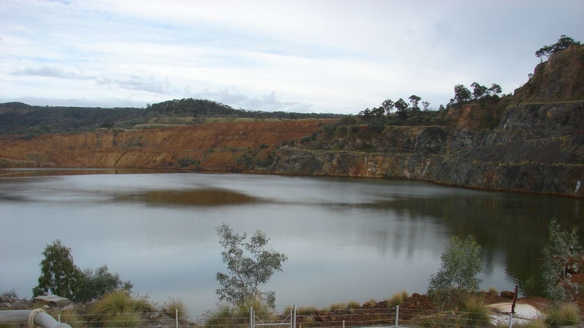 Old gold mining pit at Mount Morgan filled with water