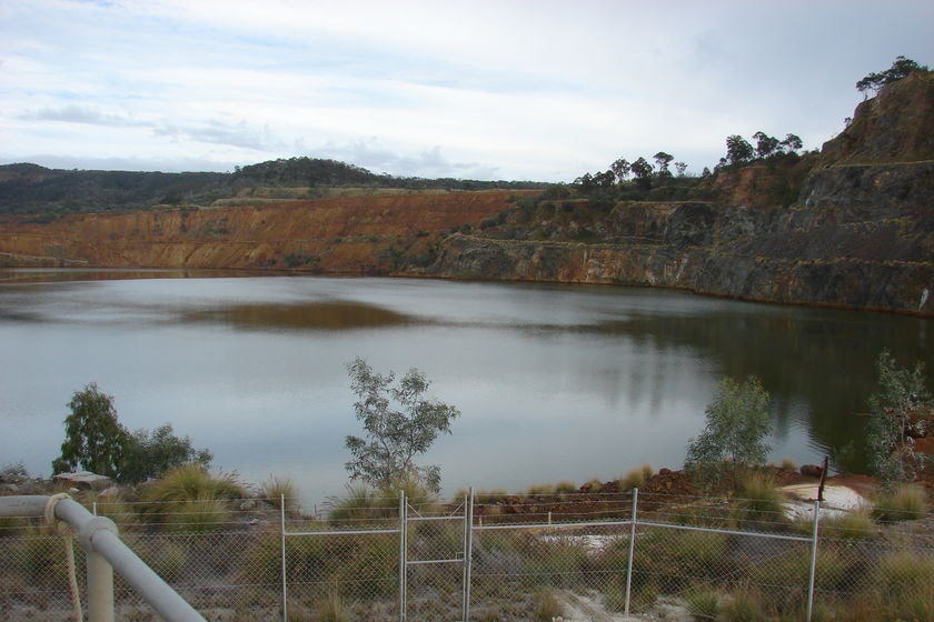 Old gold mining pit at Mount Morgan filled with water