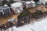 View of damaged houses along Terrigal Beach on the Central Coast.