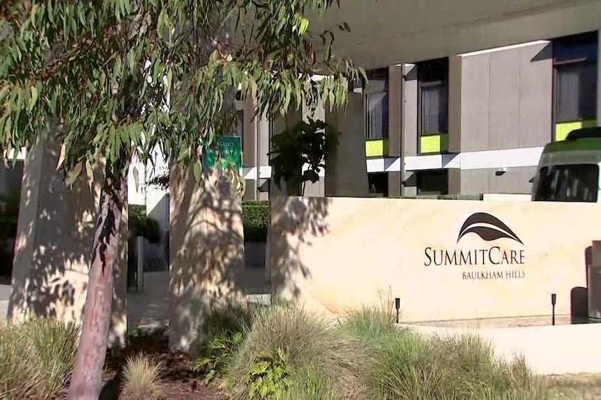Exterior of a building with a sign that reads: Summit Care.