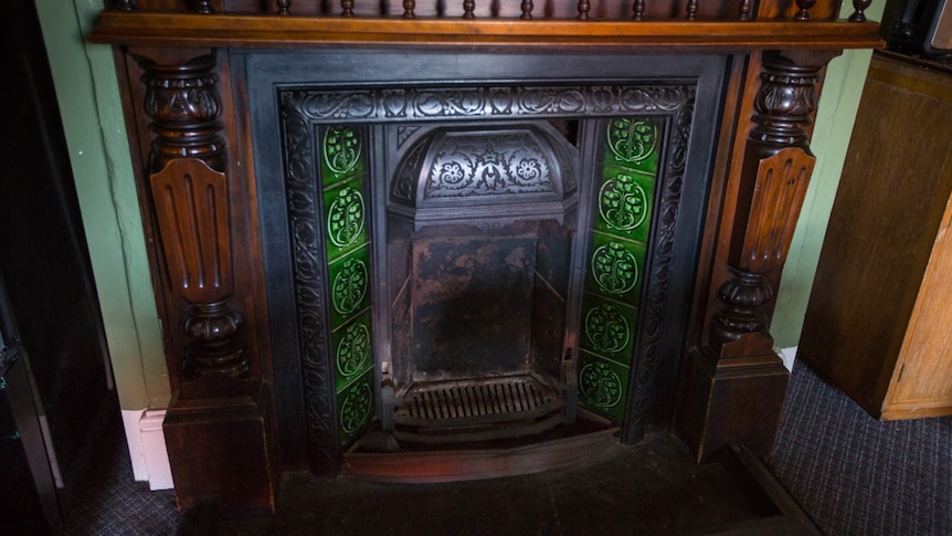 A fireplace dating back to the 19th century sits in the lounge for tenants.