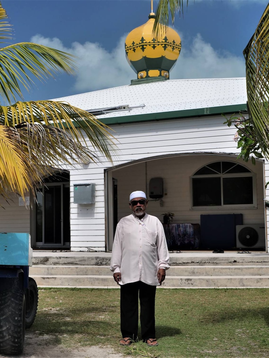 Cocos Island's Imam Haji Adam standing in front of the Home Island Mosque on June 23rd 2023.