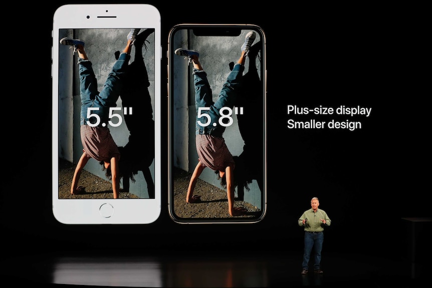 Philip W. Schiller, Senior Vice President, Worldwide Marketing of Apple, stands on stage to launch the new iPhones