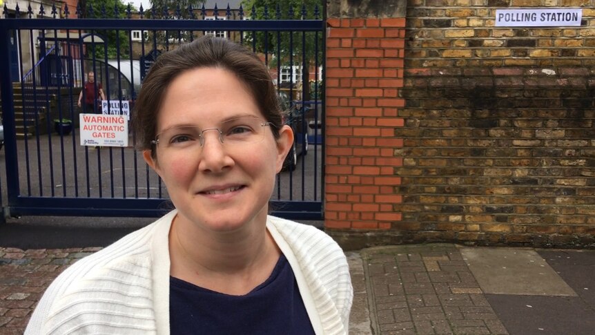 Jennifer outside a polling station