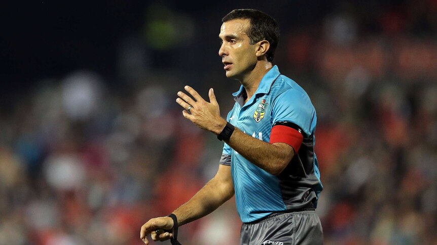 Decisions overruled ... Matt Cecchin talks to players during Monday evening's match