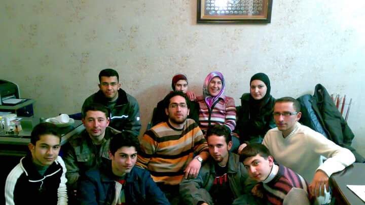 Amina with students from her language school in Aleppo.