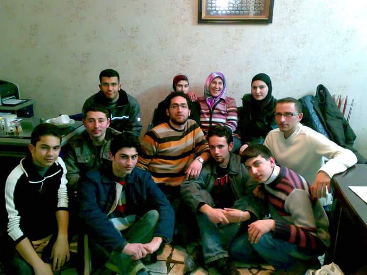 Amina with students from her language school in Aleppo.