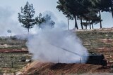 Turkish cannons fire from their army position near the Oncupinar