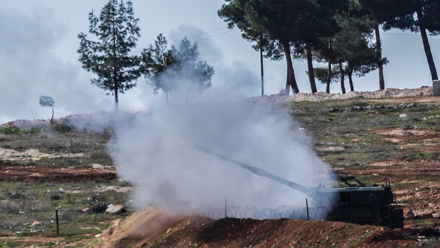 Turkish cannons fire from their army position near the Oncupinar